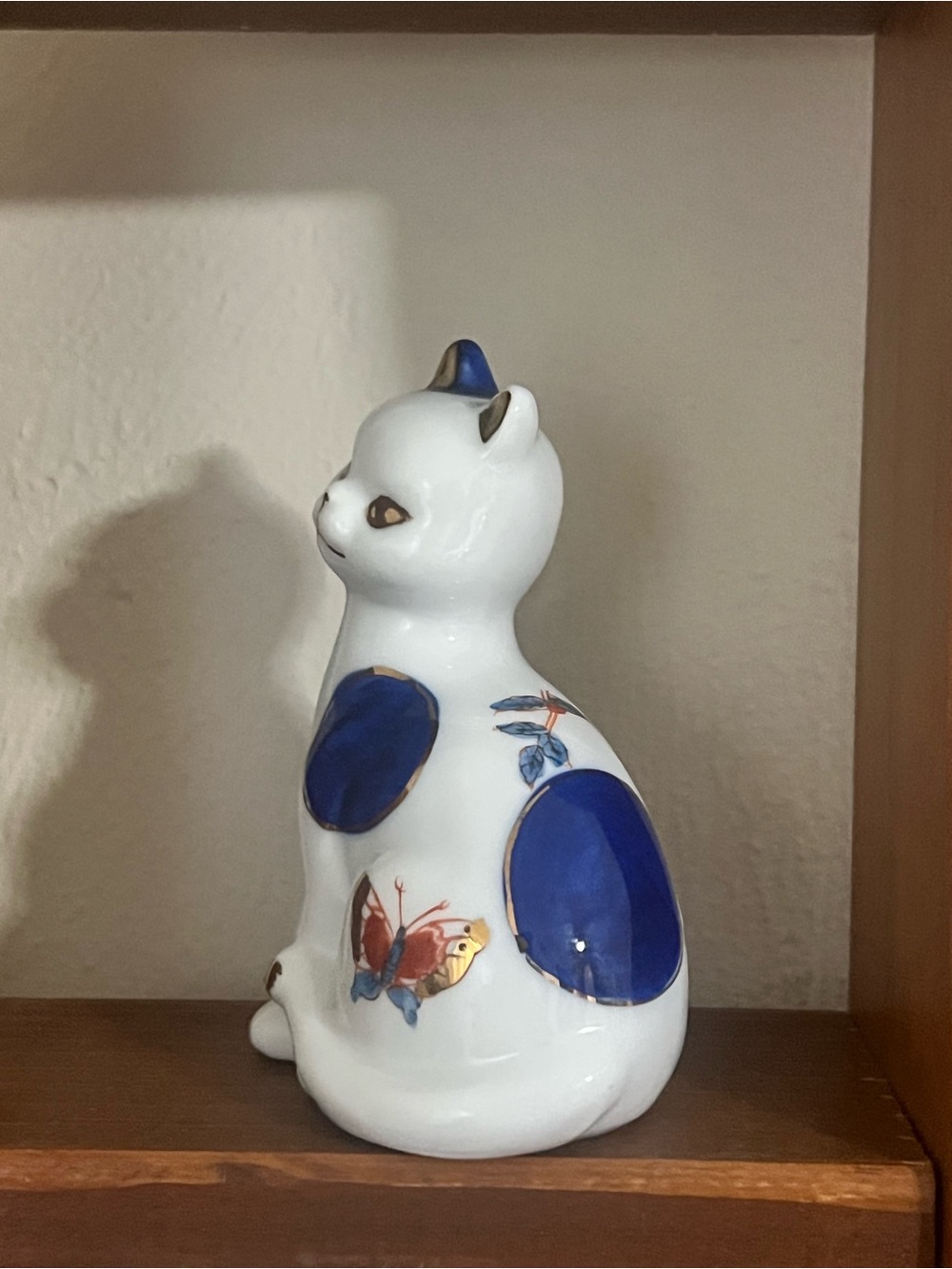 White Ceramic Cat Figurine with Blue Accents and Gold Trim - Picture 2 of 5